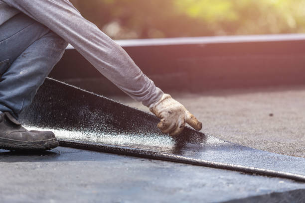 Professional Basement Waterproofing technician working in Washington, WA